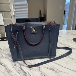 Authentic LOUIS VUITTON LOCKMETO BAG